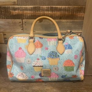 - Limited edition Dooney and Bourke cupcake satchel with strap